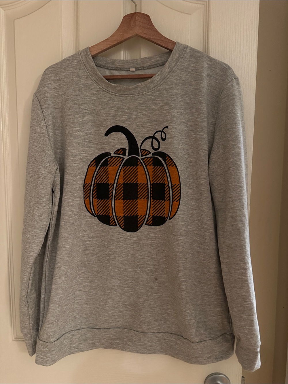 Women's Gray Crewneck Sweatshirt with Orange Plaid Pumpkin Graphic
